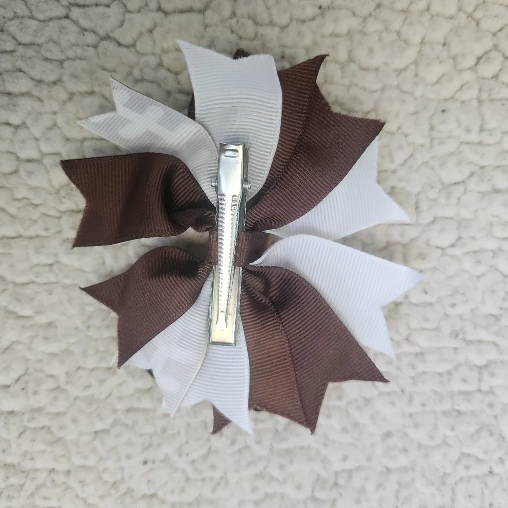 Clip in football bows